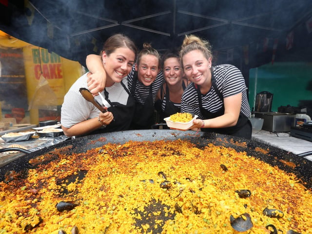Southsea Food Festival 2017 at Palmerston Road,  Southsea. Daniella Thoms, Lizzie Thoms, Nadine Connelly and Holly Murphy of Mr G's Seafood shack serving  Seafood Paella. Picture: Habibur Rahman