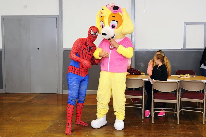 Spider Man makes a friend at the opening of California Community Hub