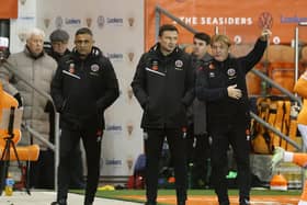 Sheffield United manager Paul Heckingbottom (centre) with Stuart McCall (right) and Jack Lester: Darren Staples / Sportimage