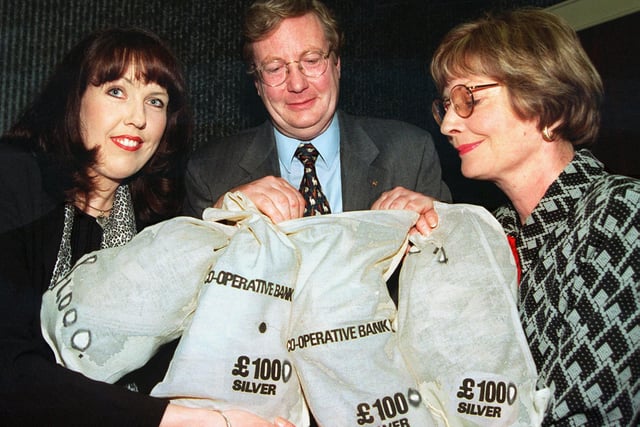 Peter Oldridge and Yvonne Woodcock (right), of the Doncaster Cancer Detection Trust, were pictured in 1998 accepting £4,000 from Alison Picton, the money was raised by Doncaster library staff and donated to the St John's Hospice.