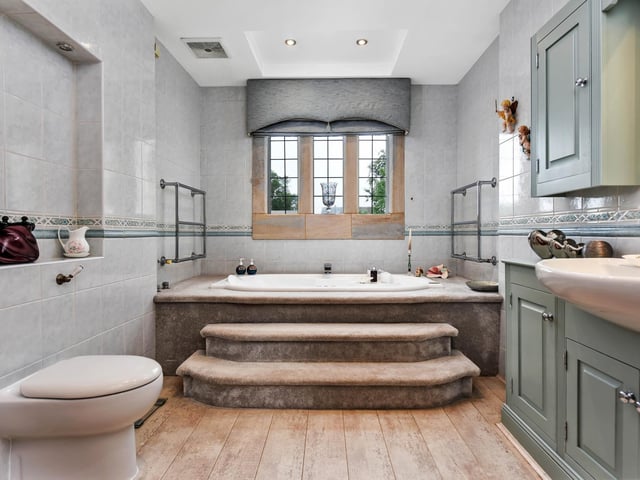 The house has five bathrooms.
