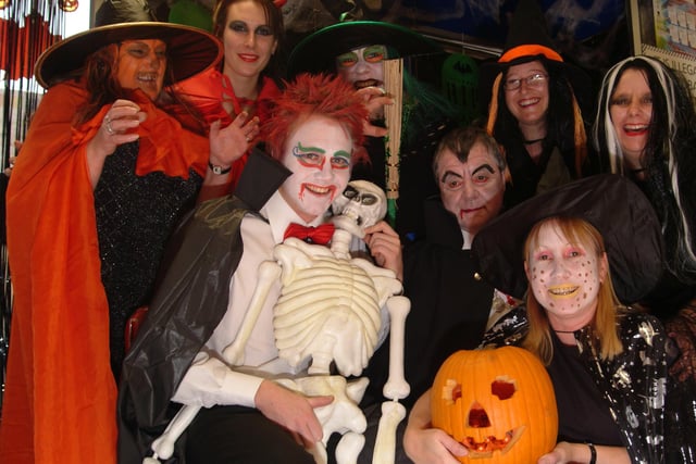 Warsop Co-op Store Manager Callum Flinton, front left, was joined by staff in 2006 for a Halloween themed charity day to raise funds for 1st Warsop Girl Guides.