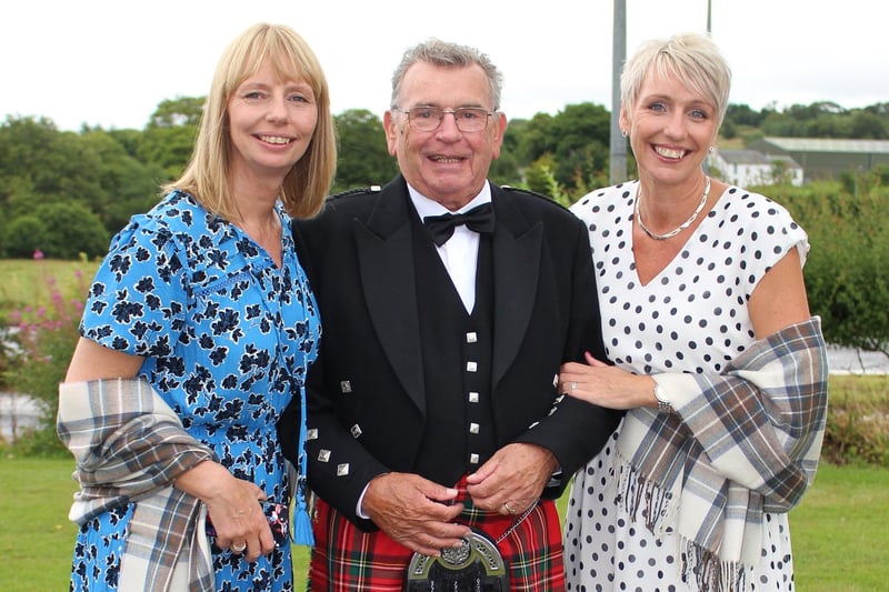 Didn't dad do well? Chieftain Walter Paterson with his girls, Gail Martin (left) and Liz Steele.