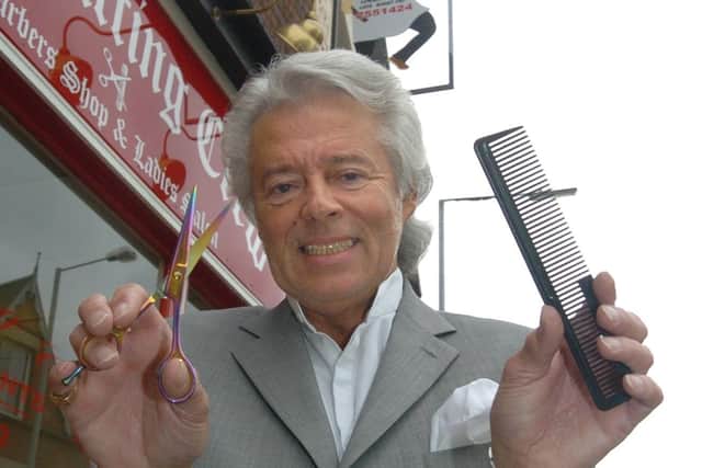 Andrew Wilkinson outside The Cutting Crew barbers he ran for 38 years.