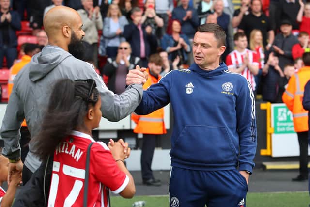Paul Heckingbottom manager of Sheffield United shakes hands with David McGoldrick after the win over Fulham: Simon Bellis / Sportimage