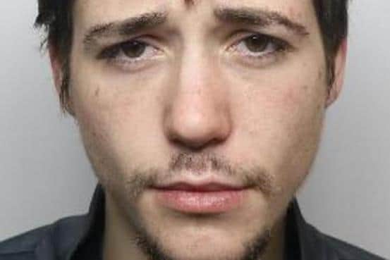 Pictured is Aaron Fewkes, aged 23, of no fixed abode, who was sentenced at Doncaster Crown Court to two years and one month of custody after he admitted four commercial burglaries, three shop thefts, causing criminal damage, possessing heroin and breaching a community order which had previously been imposed for a shoplifting theft.