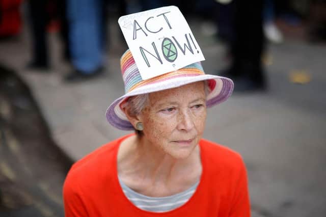 Extinction Rebellion launch fortnight of 'disruptive' protest in London (Photo by TOLGA AKMEN/AFP via Getty Images)