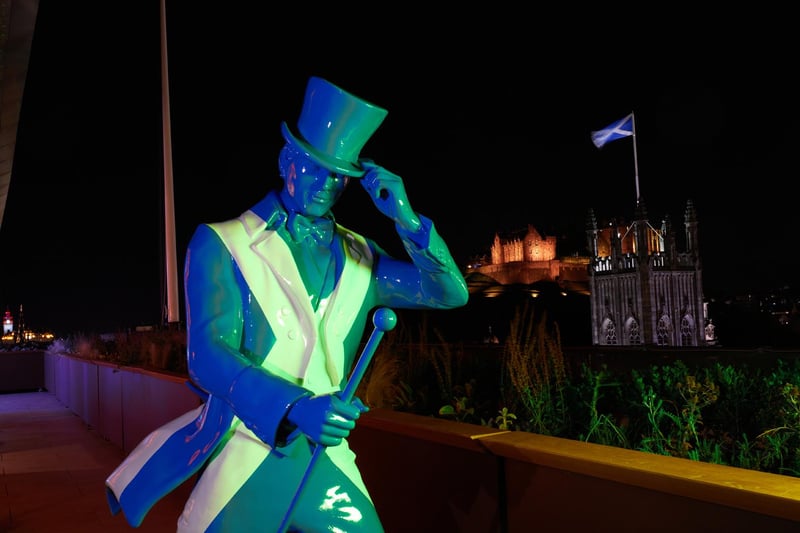 The famous 'Striding Man' associated with Johnnie Walker is represented on the rooftop terrace.