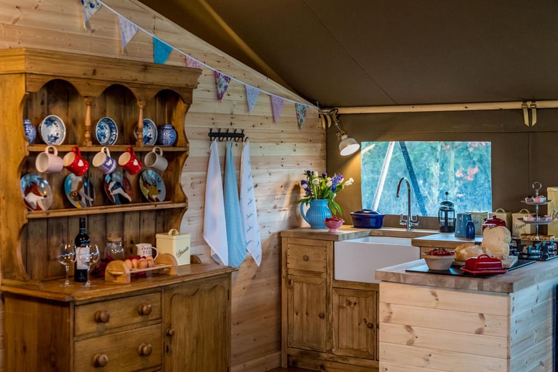 Mealtimes are made ridiculously easy, with your own well-equipped rustic kitchen, a wood-burning range cooker, and a gas barbecue.