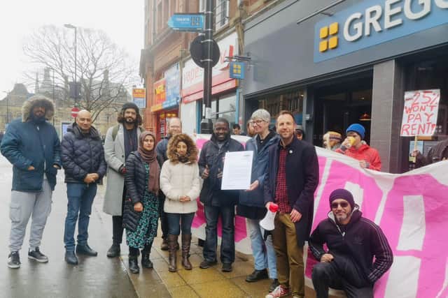 Sheffield Labour councillors join a Just Eat/Stuart delivery drivers' picket line outside a Gregg's takeaway on Pinstone Street, Sheffield, taking a letter of solidarity from council leader Coun Terry Fox