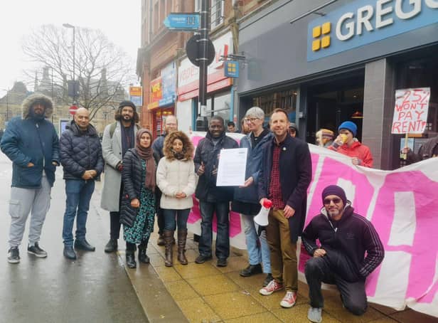Sheffield Labour councillors join a Just Eat/Stuart delivery drivers' picket line outside a Gregg's takeaway on Pinstone Street, Sheffield, taking a letter of solidarity from council leader Coun Terry Fox