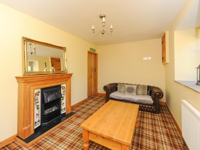 The sitting room or fourth bedroom is on the ground floor.