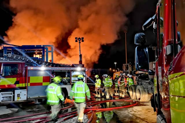 Dramatic pictures show firefighters at the scene of the blaze at Balby Carr Bank recycling site, this evening. PIcture: South Yorkshire Fire and Rescue Service