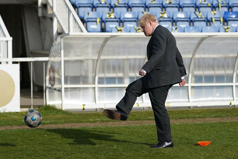 Prime Minister Boris Johnson kicking a football  during a visit to the Hartlepool United Football Club, in Hartlepool, ahead of the May 6 by-election. Picture date: Friday April 23, 2021. PA Photo.