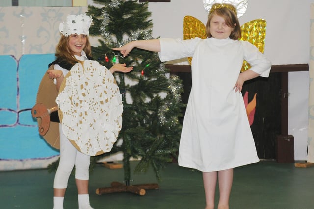Angel Mollie Bujnowski and Snowflake Piper Ridley pictured during the 2011 Nativity. Does this bring back memories?