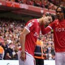 Nottingham Forest's Djed Spence (right) celebrates the opening goal from team mate Brennan Johnson: Zac Goodwin/PA Wire.