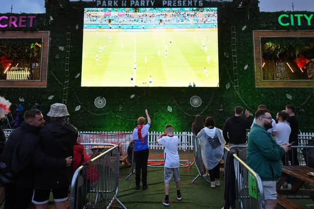 England fans watch the action from Euro 2020 on a big screen in Manchester (Photo by Anthony Devlin/Getty Images)