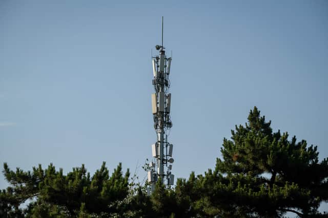 A cellphone tower, used for a 5G network, is seen on a street in Beijing in Beijing on May 19, 2020. (Photo by NICOLAS ASFOURI / AFP) (Photo by NICOLAS ASFOURI/AFP via Getty Images)