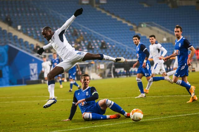 Rangers midfielder Glen Kamara vies for the ball with Lech Poznan defender Lubomir Satka