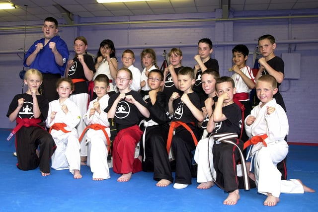 The centre was opened by Dave Turton, head of the Self Defence Federation (UK) in 2003. Our picture shows Andy (back row, left) with some of his students at the Sandford Road, Balby based centre.