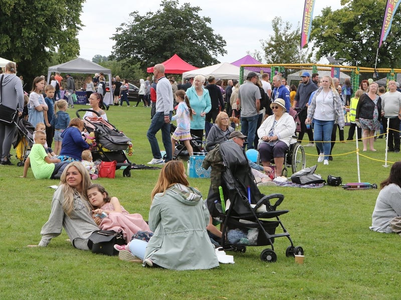 Families relaxing and picnicking on the grass at Kingsway Park. It all made for a very pleasant atmosphere.
