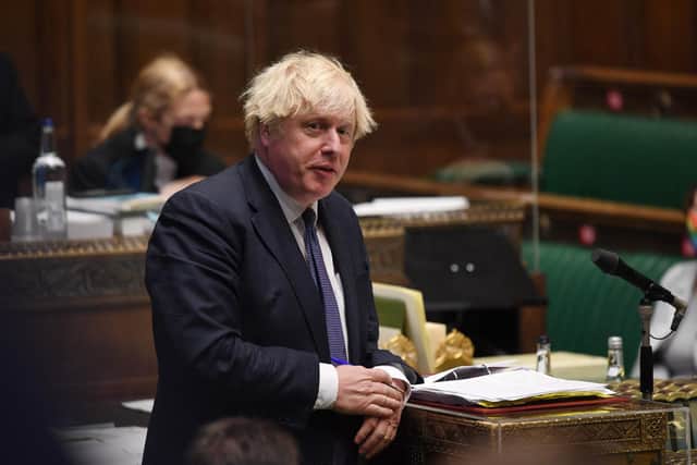 Britain's Prime Minister Boris Johnson attending the weekly Prime Minister's Questions (PMQs) in the House of Common: JESSICA TAYLOR/AFP via Getty Images