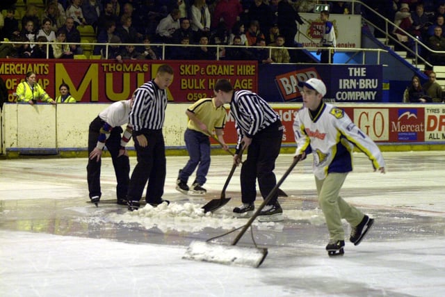 Referee Graham Horner tried to fix the hole in the ice with a fire extinguisher, but it failed. The ice cutting machine then had to be towed off the ice with the help of a 4x4 vehicle (Pic: Bill Dickman/Fife Free Press)