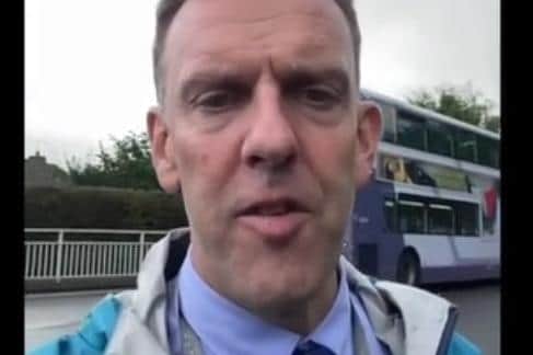 School pupils could face long waits to get home due to significant cuts to school bus services, fears a Sheffield headteacher Paul Haigh, pictured at the bus queue at King Ecgberts School