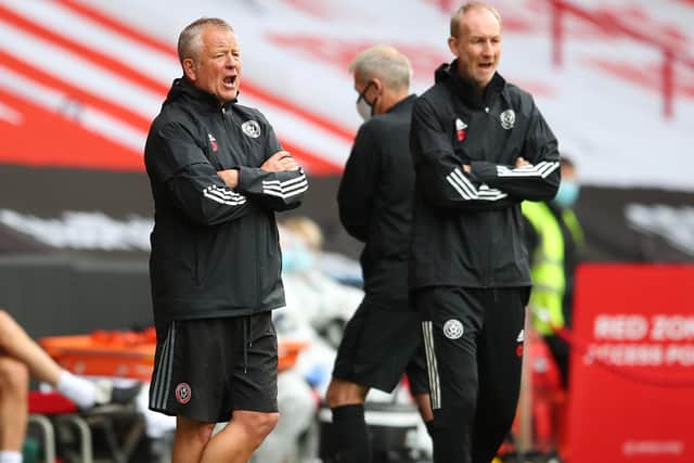 Chris Wilder (L) has no problems with demanding hard work from his players: Simon Bellis/Sportimage