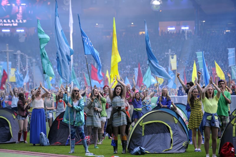 Volunteers perform during the closing ceremony of the 2014 Commonwealth Games at Hampden Park in Glasgow.