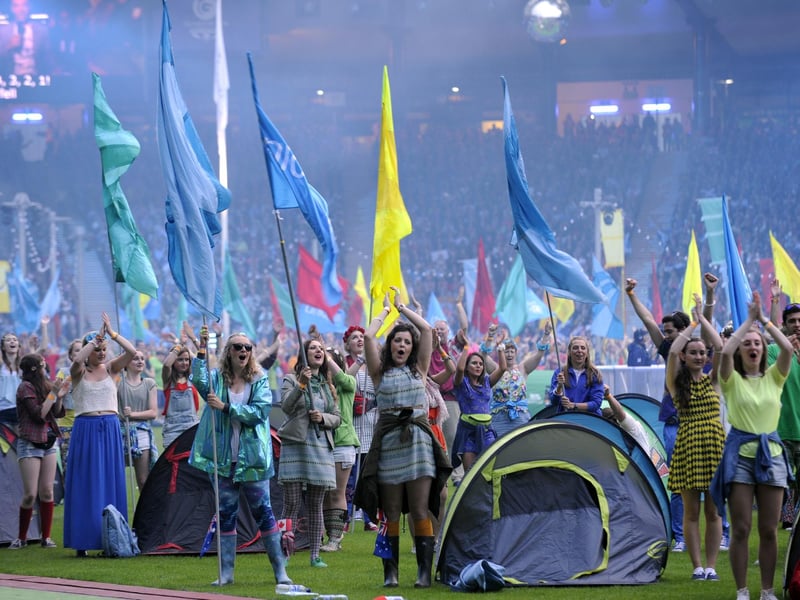 Volunteers perform during the closing ceremony of the 2014 Commonwealth Games at Hampden Park in Glasgow.
