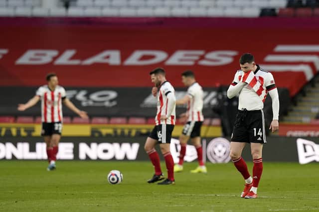 Oliver Burke, right, has been identified as Sheffield United's dangerman: Andrew Yates / Sportimage