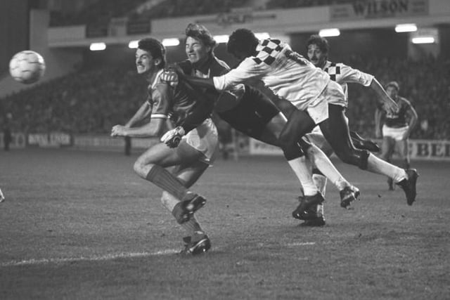 Guy Hubart and Adao da Silva combine to keep out Dave McPherson in the UEFA Cup second round first leg win.