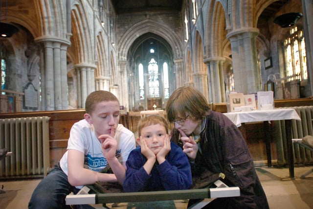 Boys Brigade members Anthony Miller, Jack Harrion and Peter Lowther were having a sleepover at the church 13 years ago.