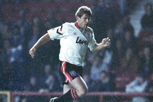 Perhaps a bit of a surprise but this is an under-appreciated shirt, a third kit used between 1991 and 1993 and Umbro could do worse than to replicate now. Clean, white with just enough of the traditional colours and a classic