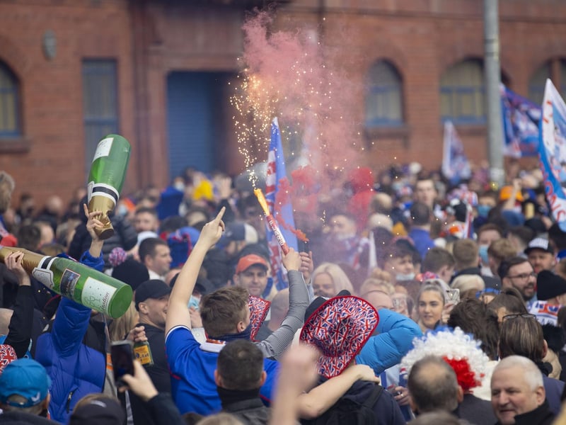 Rangers fans gather outside Ibrox as they are crowned champions on March 07, 2021, in Glasgow