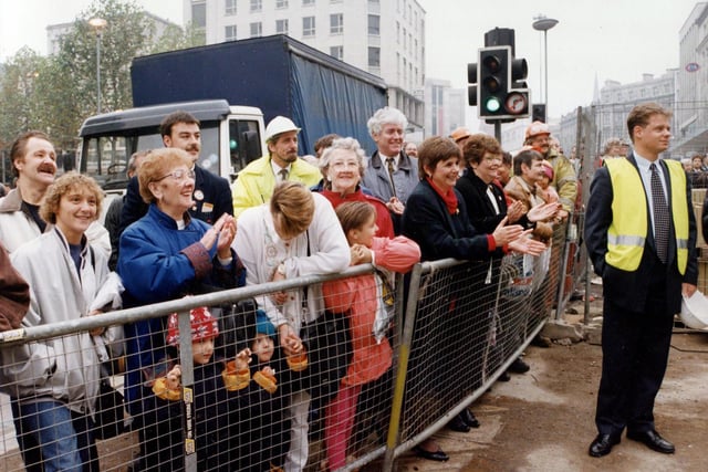 Smiles of welcome from onlookers at the arrival of Supertram in Commercial Street for the first time on November 5, 1993