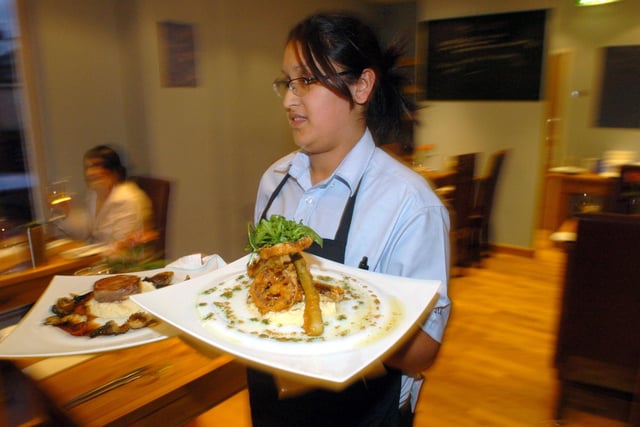 Waitress Nazneen Kiyani at 543 restaurant, on Ecclesall Road, Sheffield, in October 2004