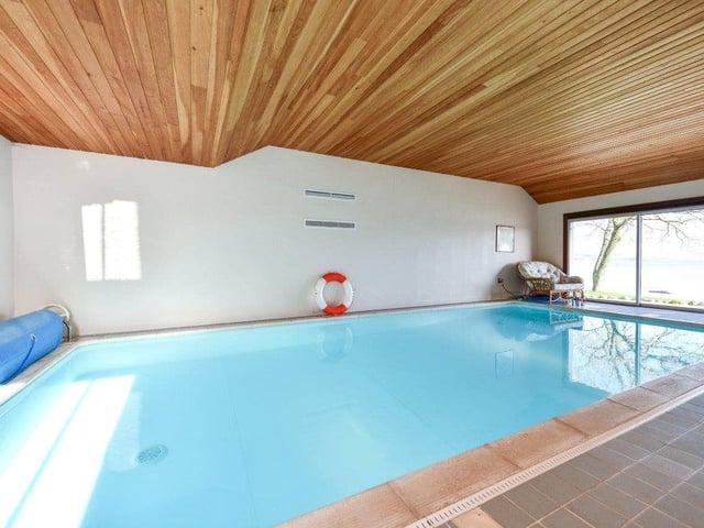 The property has an indoor, heated swimming pool.