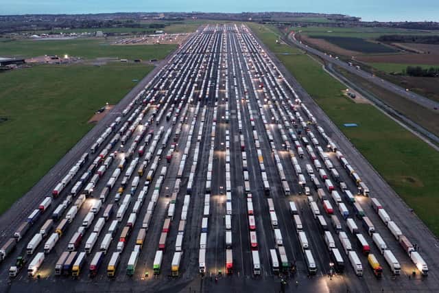 Freight lorries and heavy goods vehicles parked on the tarmac at Manston Airport near Ramsgate  (Photo by William EDWARDS / AFP) (Photo by WILLIAM EDWARDS/AFP via Getty Images)