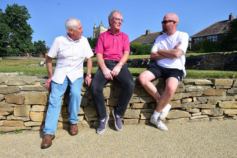 From left, Bob Robinson, Peter Wilson and Paul Robinson sharing memories, Headland, Hartlepool.