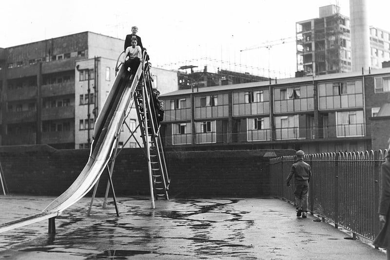 Children playing in the playground of Park Hill flats in 1959