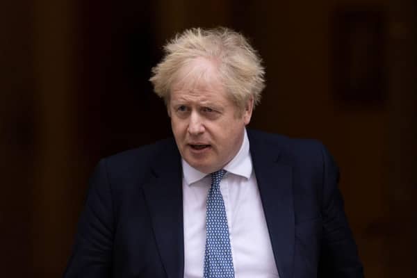 LONDON, ENGLAND - FEBRUARY 02: British Prime Minister Boris Johnson leaves 10 Downing Street to attend the weekly Prime Ministers Questions on February 02, 2022 in London, England. Boris Johnson holds his first Prime Minister's Questions since the Sue Gray Report into "Partygate" has been made public. (Photo by Dan Kitwood/Getty Images)