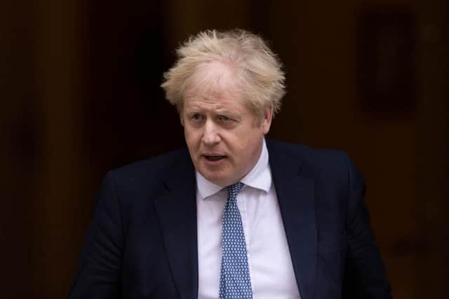 LONDON, ENGLAND - FEBRUARY 02: British Prime Minister Boris Johnson leaves 10 Downing Street to attend the weekly Prime Ministers Questions on February 02, 2022 in London, England. Boris Johnson holds his first Prime Minister's Questions since the Sue Gray Report into "Partygate" has been made public. (Photo by Dan Kitwood/Getty Images)