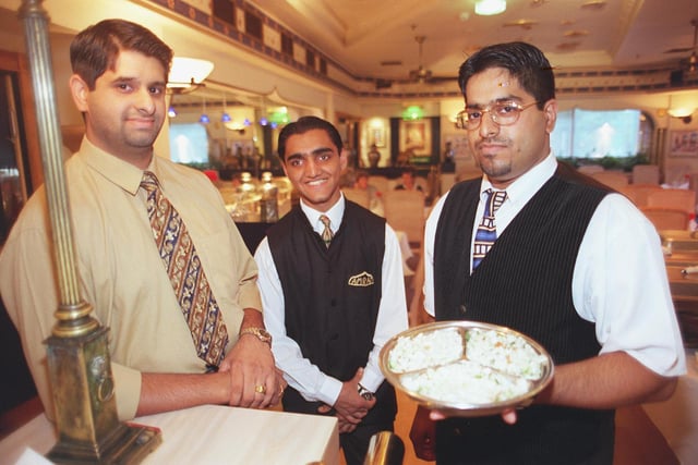 Manager Nadeem Majid, waiter Saleem Khail, and assistant manager Saleem Majid of Amraj restaurant in 1999