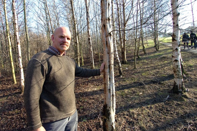 Ted Talbot of the South Yorkshire Forest Partnership pictured with young trees that were planted in 1997 in Meersbrook Park