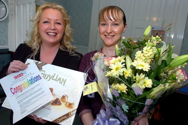 Doncaster Star Valentine competition winner Kelly Clarke (right), aged 27, of Skellow, receives her prizes from Karren Wake, Doncaster Star advertisement manager