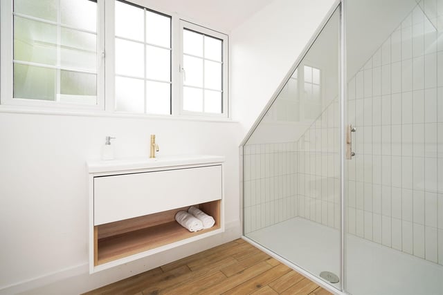 The master en-suite is just another example of the tremendous modern finish throughout this property. It comes with all the en-suite basics and a lovely walk-in shower.
