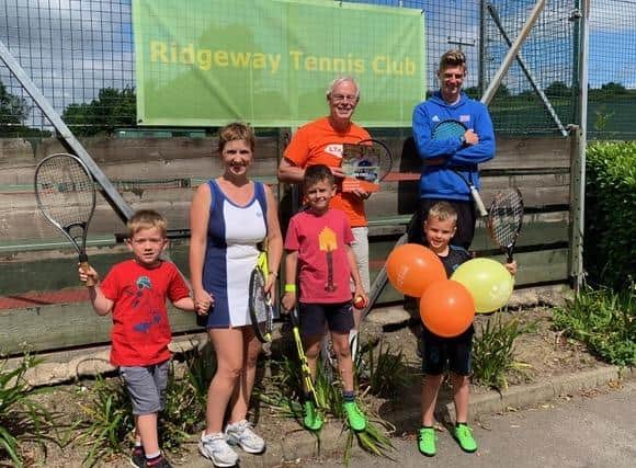 Mick Mason, Ridgeway Tennis Club chairman (centre), with other members of the club.