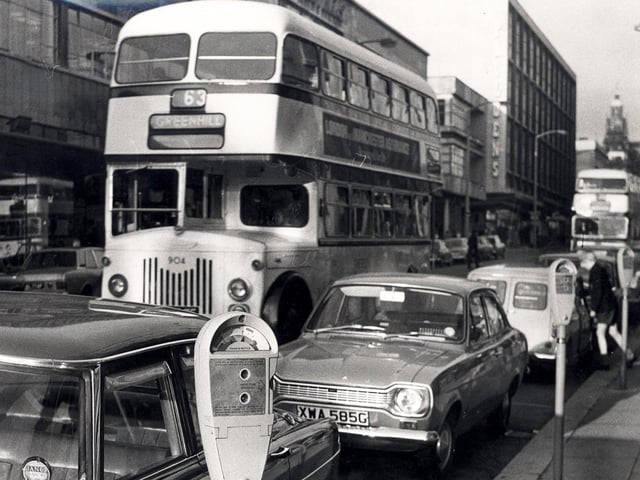 Parking meters on The Moor with traffic flowing on February 4, 1969